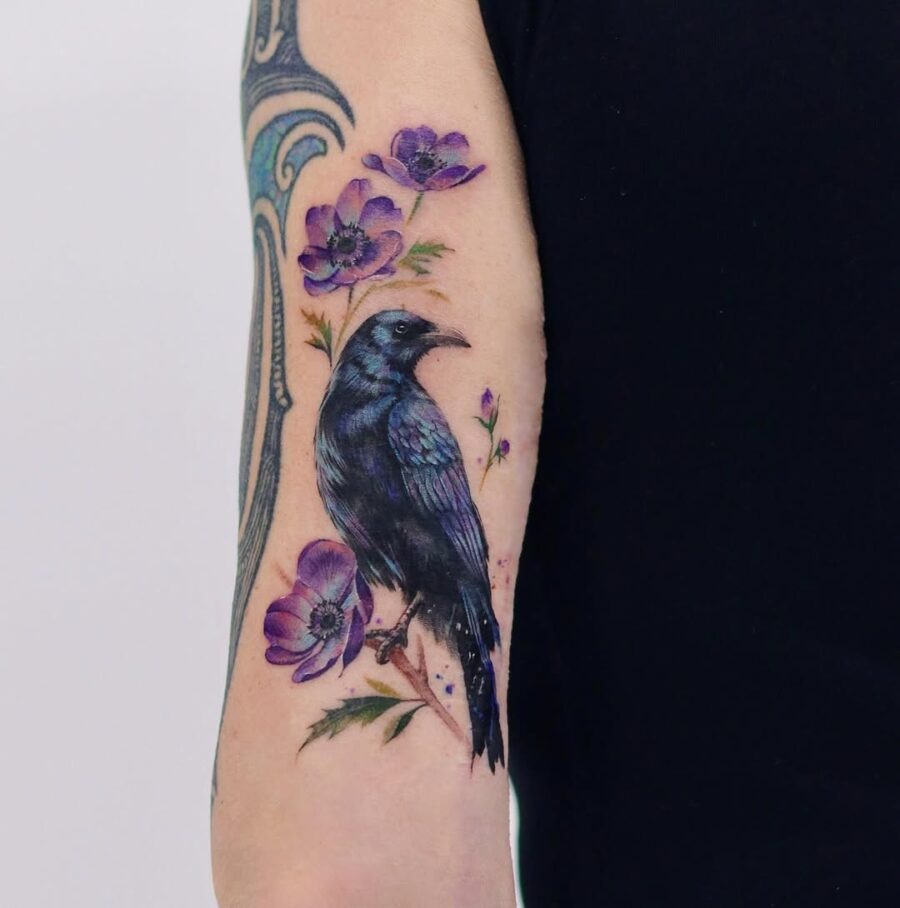 Vibrant Raven Tattoo Surrounded by Flowers Tattoo Design