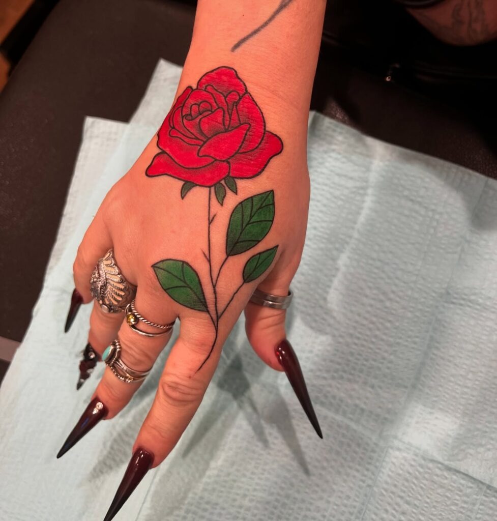 Bold Red Rose Tattoo on Hand Tattoo Design