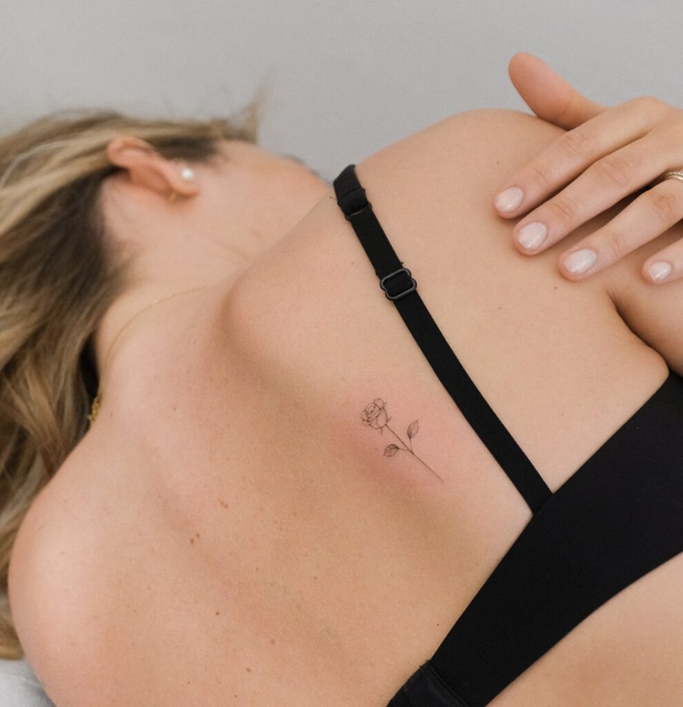 Delicate Single Rose Tattoo on Shoulder Blade Tattoo Design