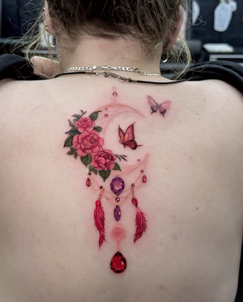 Dreamcatcher Tattoo with Roses, Butterflies, and Gems Tattoo Design
