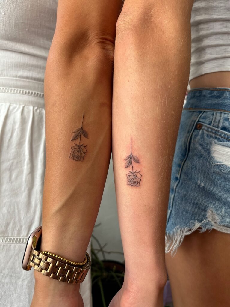 Matching Mother and Daughter Rose Tattoos on Forearms Tattoo Design