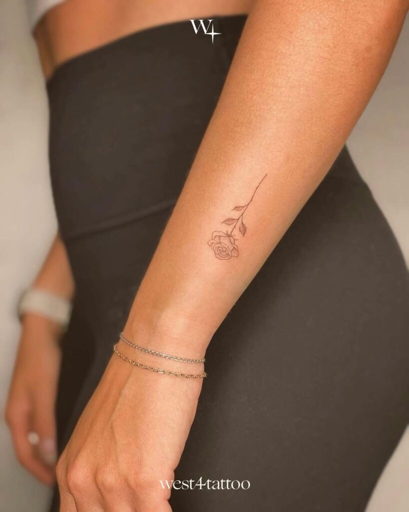 Minimalist Rose Tattoo on Forearm Tattoo Design