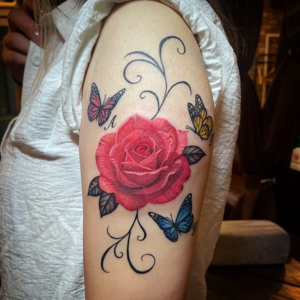 Rose and Butterflies Tattoo on Upper Arm Tattoo Design