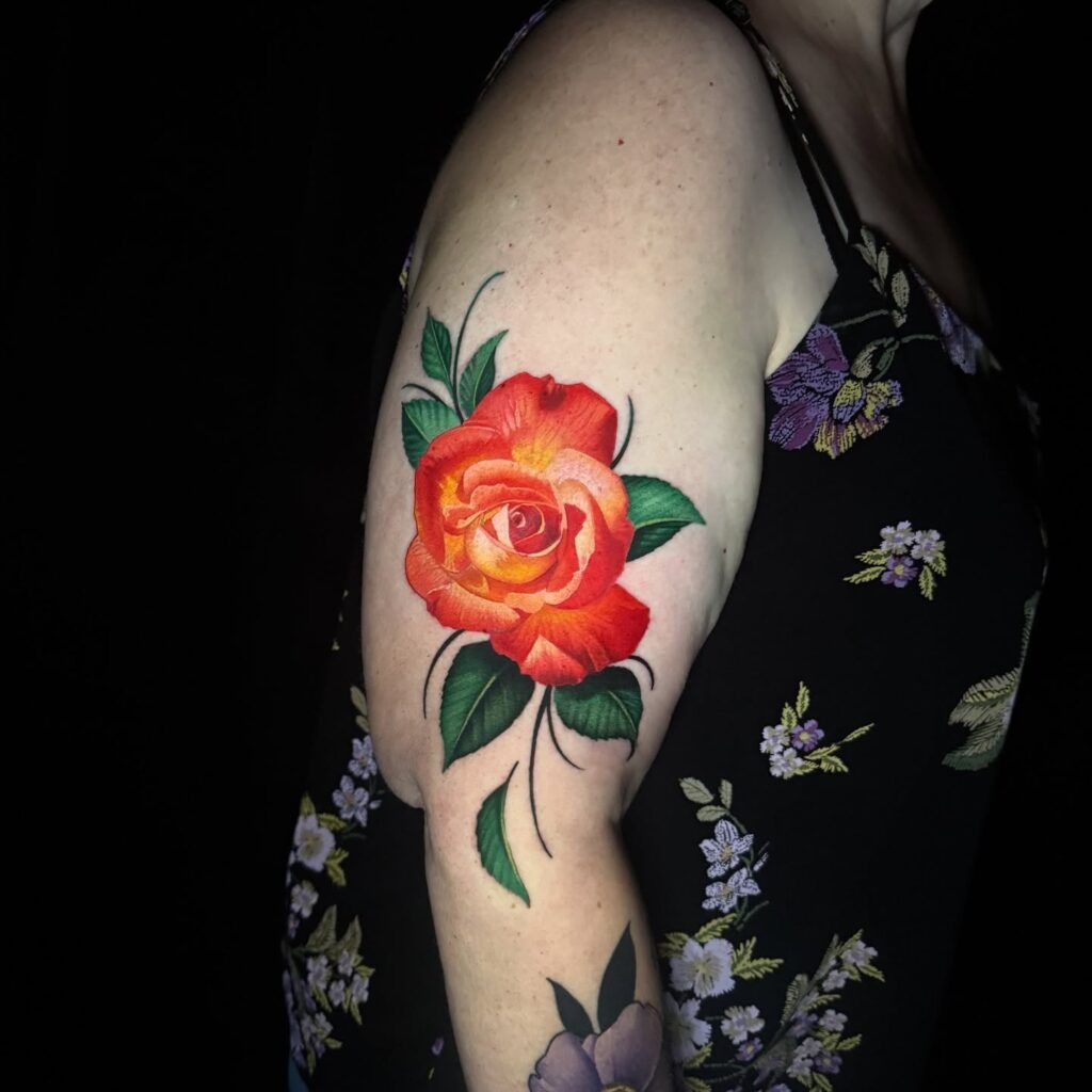 Vibrant Orange and Yellow Rose Tattoo on Arm Tattoo Design