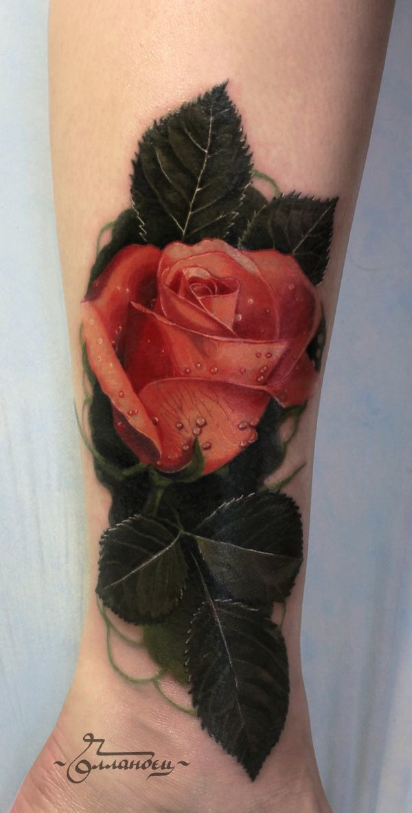 Rose tattoo on the back of wrist Tattoo Design