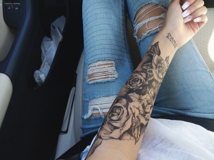 Several Rose Tattoo Flowers On A Girl’s Arm Tattoo Design