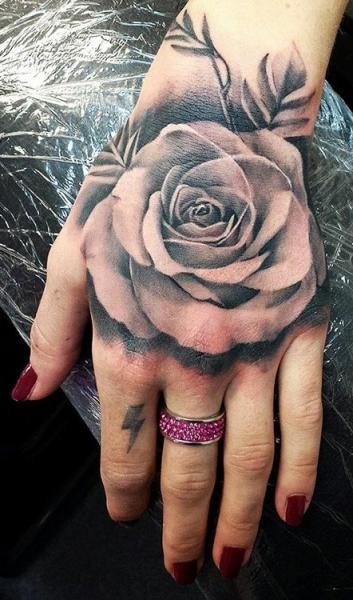 Sexy Rose Tattoo On A Girls Hand Tattoo Design