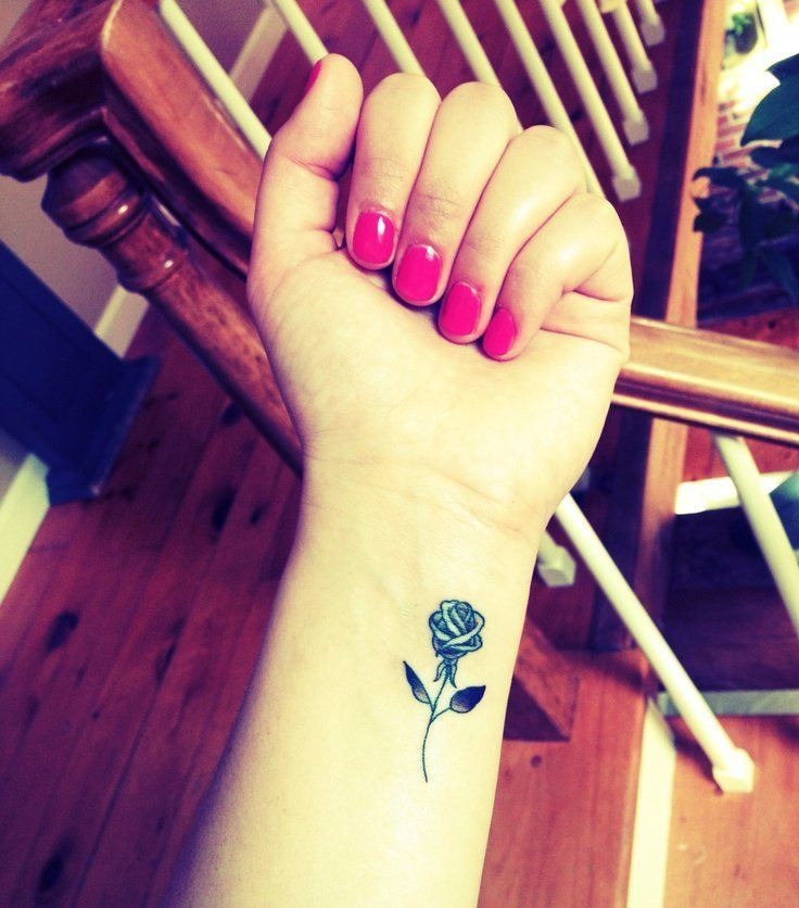 Tiny Rose Flower On A Girls Arm Tattoo Design