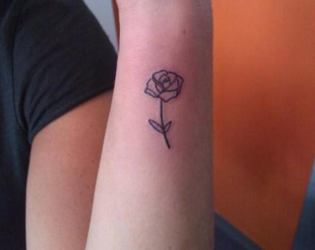 Tiny Rose Flower On Guys Under Arm Tattoo Design