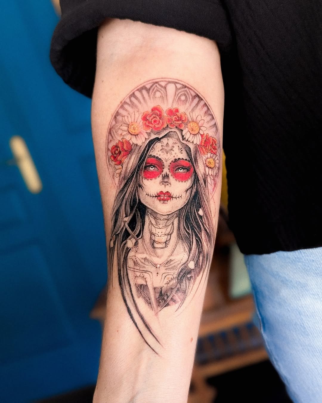 Intricate Santa Muerte tattoo with floral details Tattoo Design