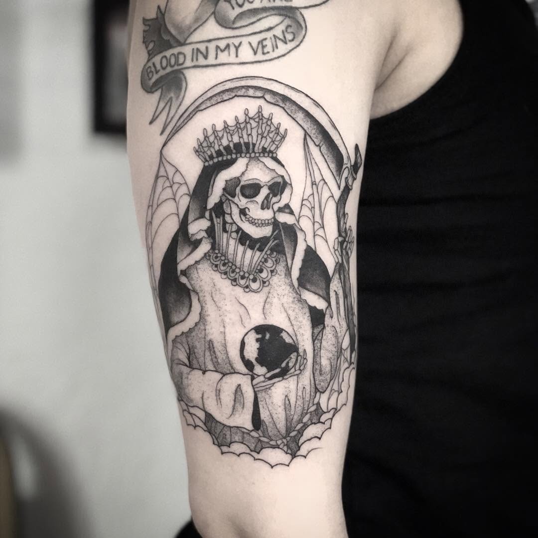 Intricate Santa Muerte tattoo with powerful symbolism Tattoo Design