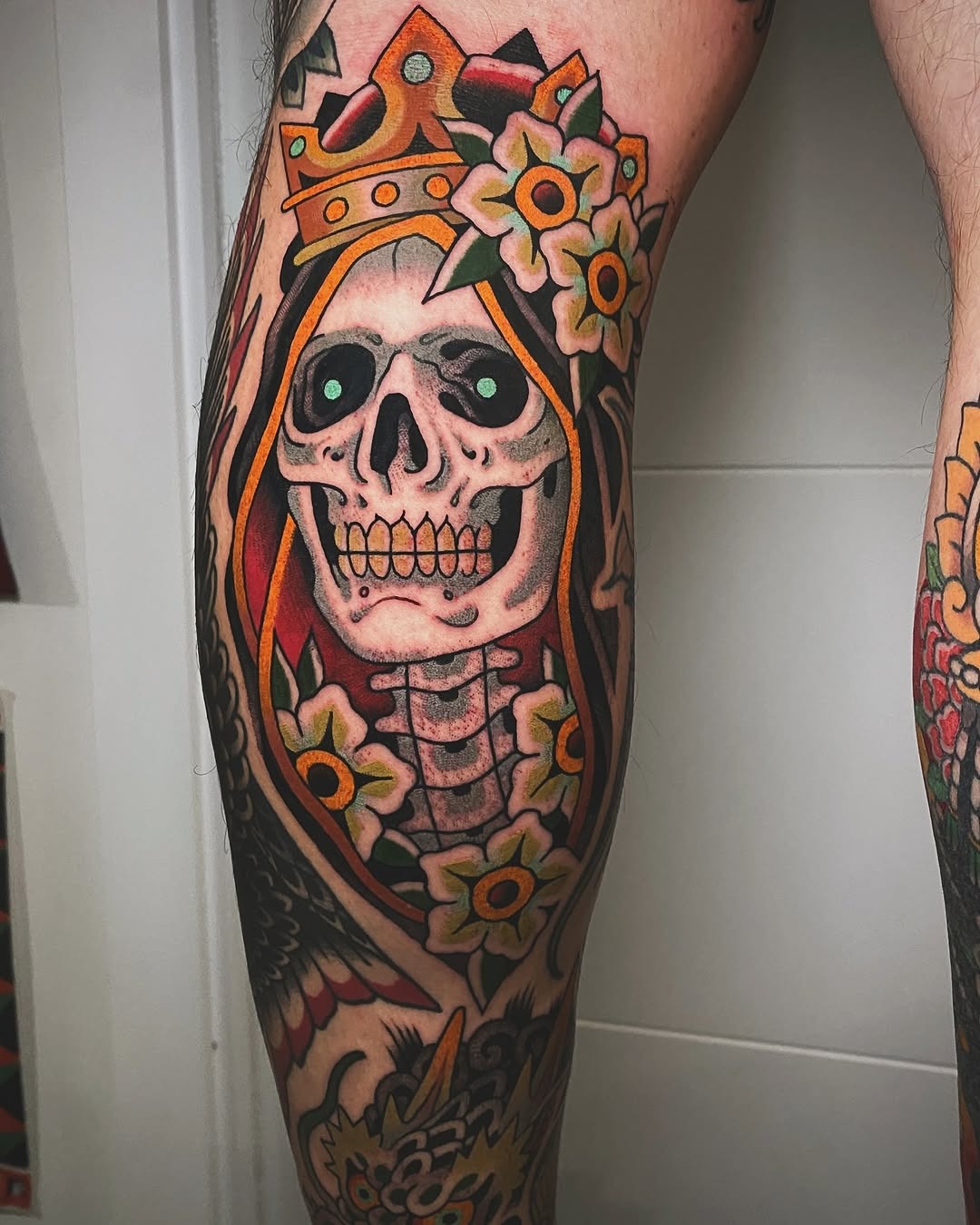 Vibrant Santa Muerte Tattoo with Floral Accents Tattoo Design