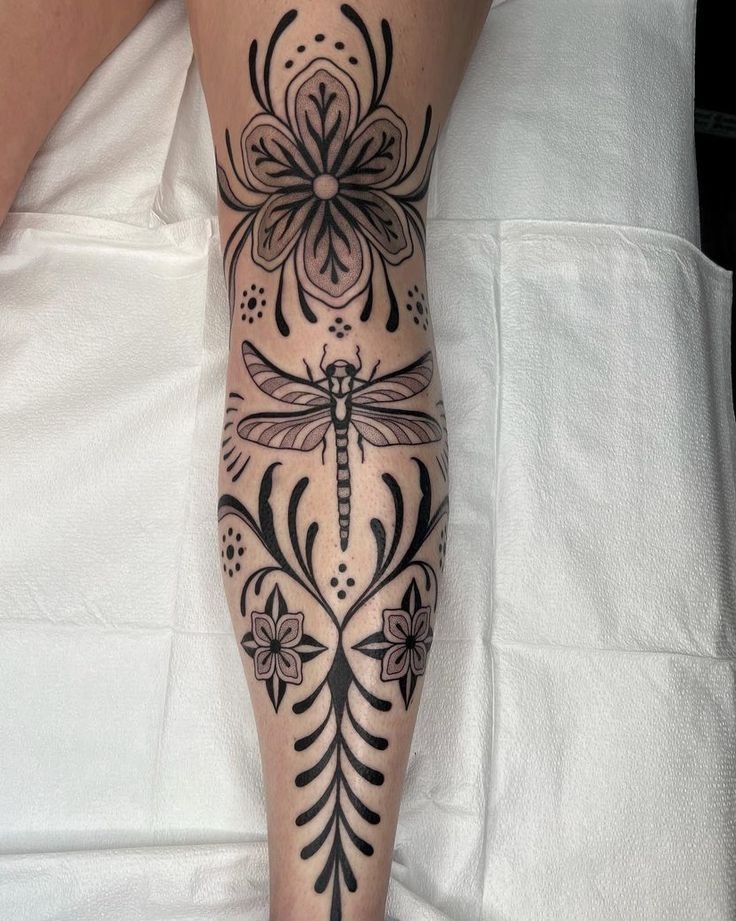 Ornamental Dragonfly and Floral Symmetry Tattoo Design