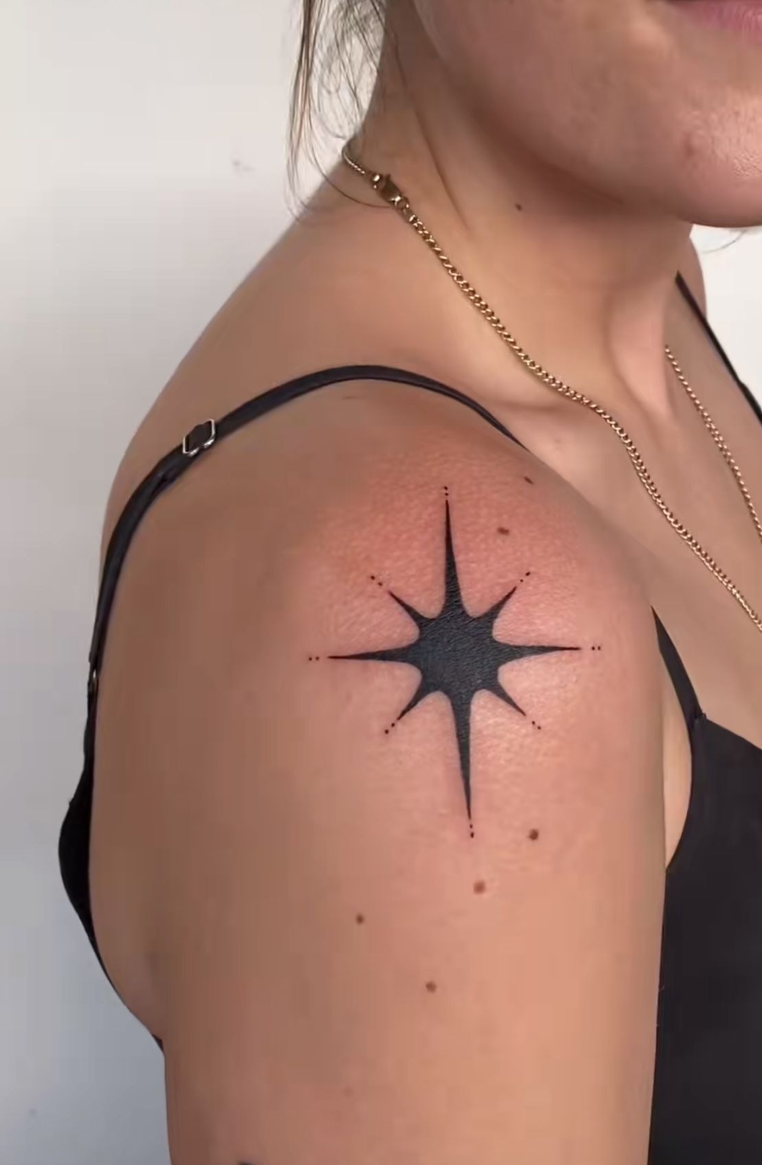 Bold Starburst Shoulder Tattoo Tattoo Design