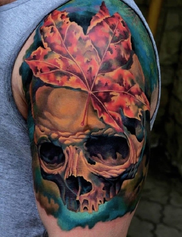 Autumn or Halloween inspired skull tattoo on arm Tattoo Design