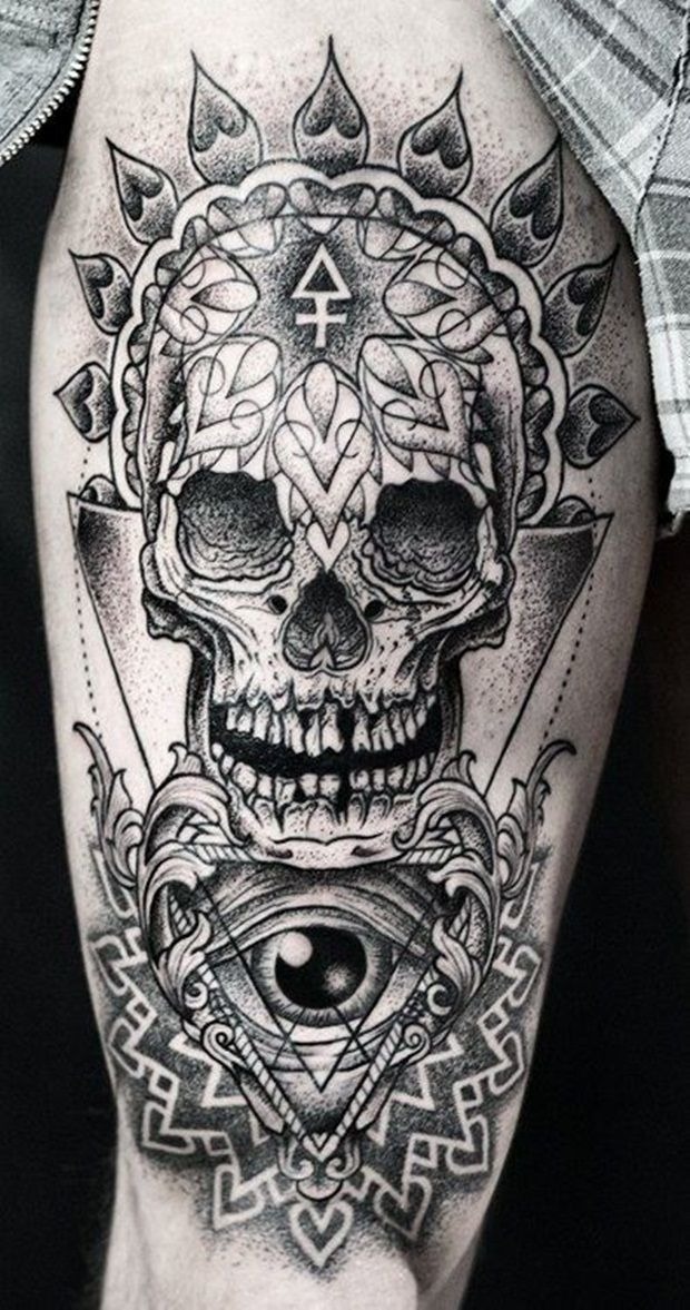 Cool skull tattoo on a guy’s upper arm Tattoo Design