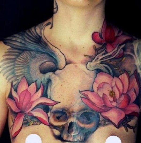 Japanese inspired skull chest tattoo with lotus flowers Tattoo Design