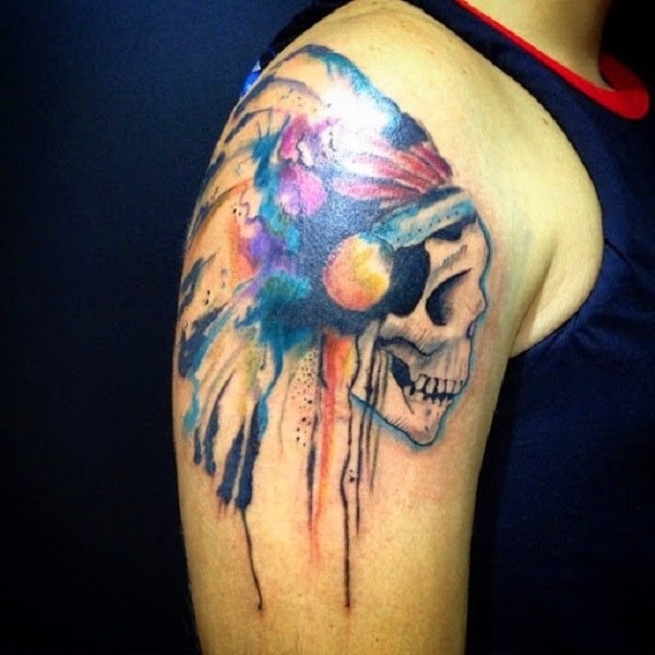 Multi-colored Aztec skull tattoo on arm Tattoo Design