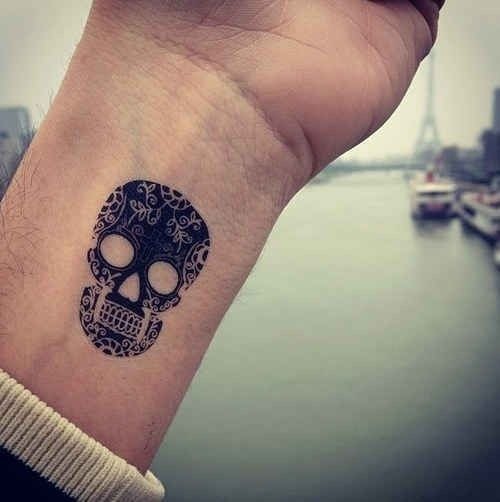 Simple andsmall tattooon wrist Tattoo Design