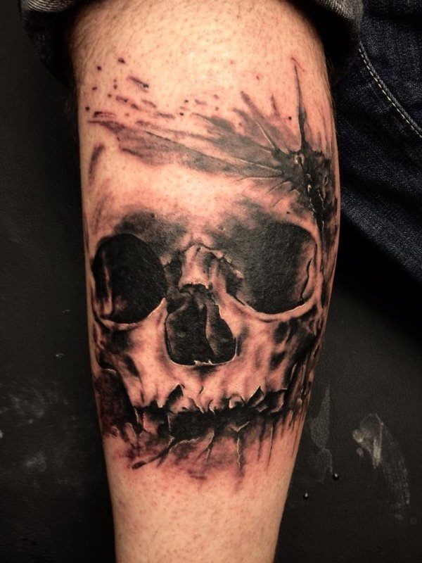 Stamped, dark skull tattoo on leg Tattoo Design