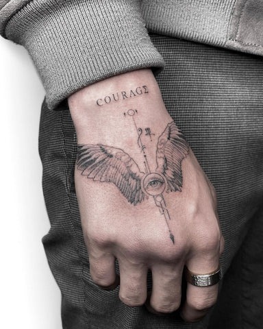 Courage and Wings Hand Tattoo Tattoo Design
