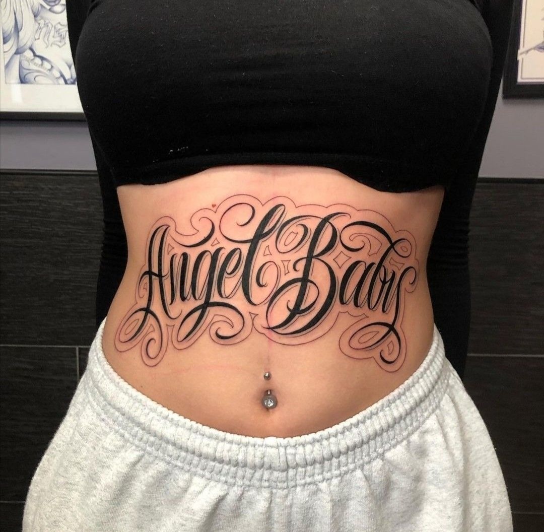 Angel Baby Script Across the Lower Stomach Tattoo Design