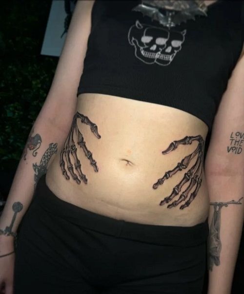 Skeletal Hands Crawling on the Stomach Tattoo Design
