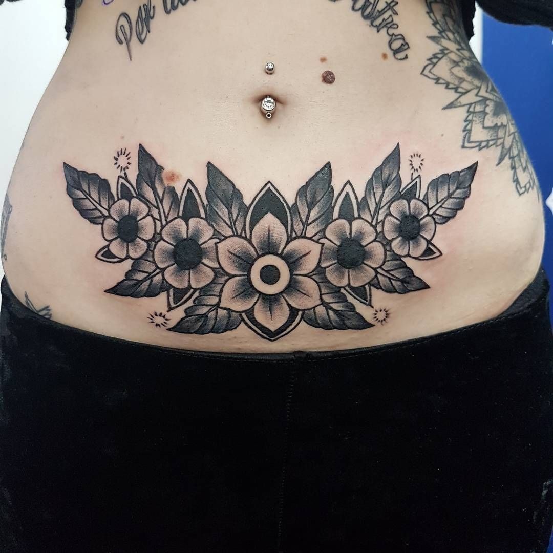 Symmetrical Floral Band on the Lower Stomach Tattoo Design