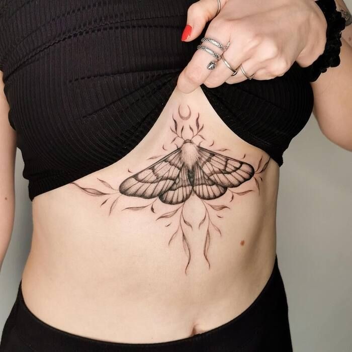 Underboob Moth with Crescent Details Tattoo Design