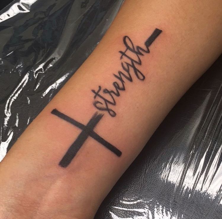 Bold Cross and Strength Script Tattoo, a tattoo design rendered in bold.