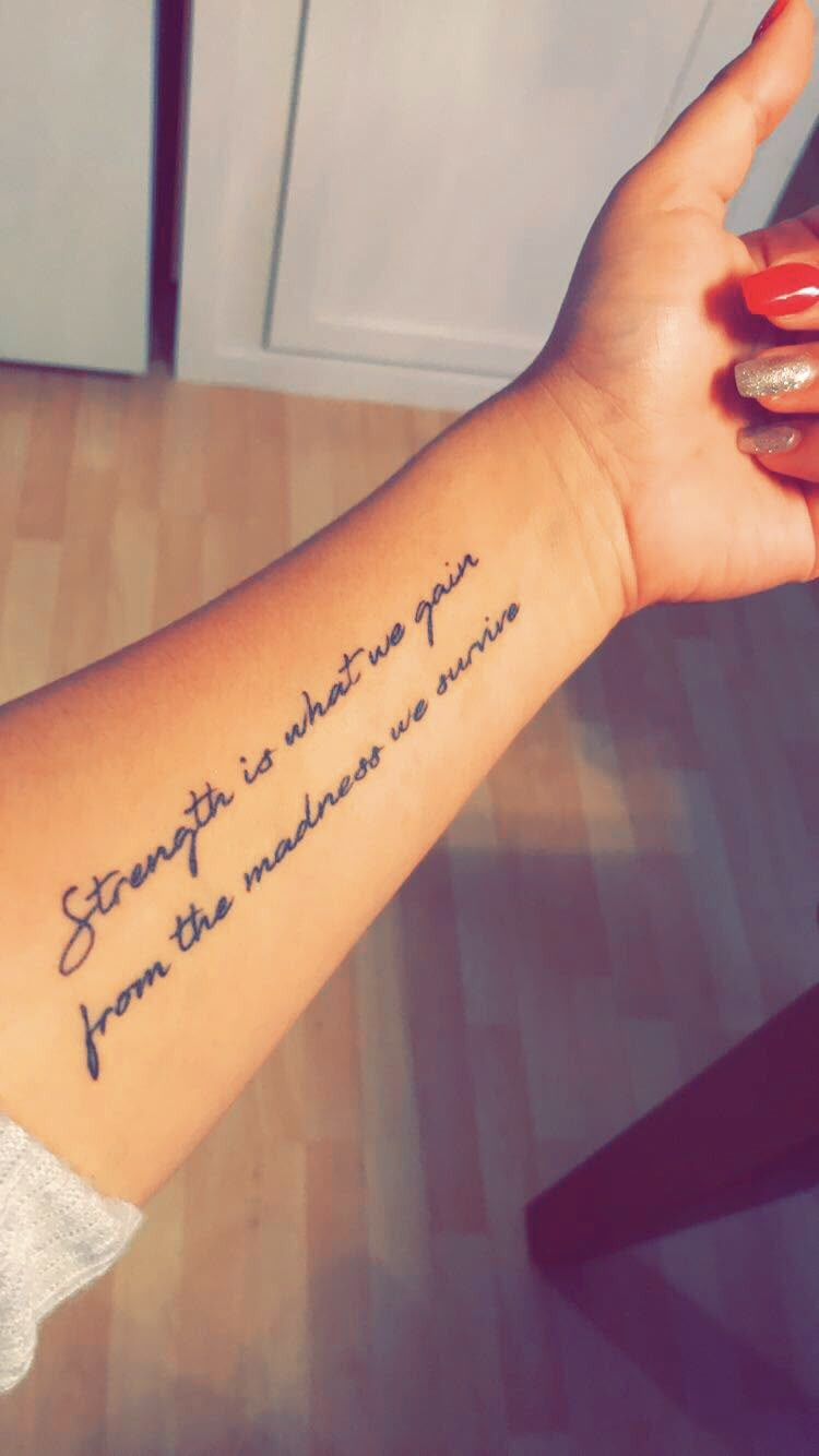 Inspirational Strength Quote Script, a tattoo design rendered in clean detailed linework for the hand.