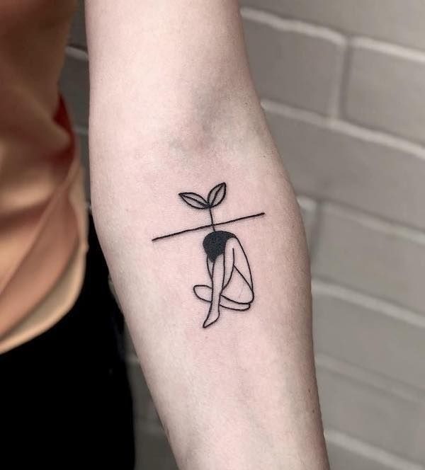 Minimalist Inner Strength Symbol, a tattoo design rendered in clean detailed linework.
