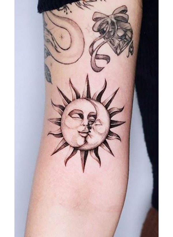Blissful Sun Accepts Gentle Moon Kiss Tattoo Design