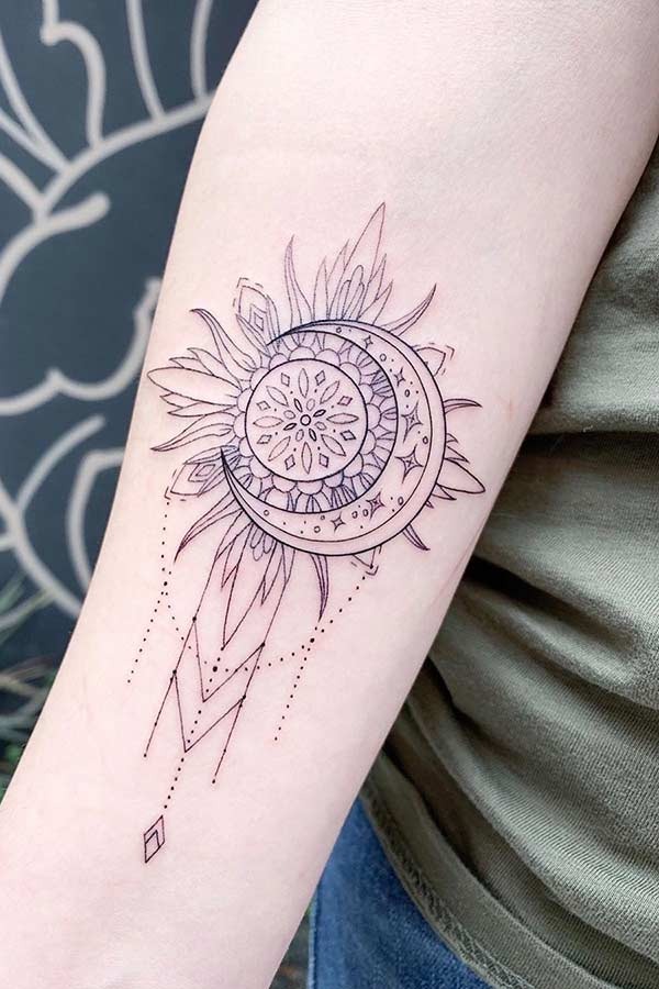 Dreamcatcher Mandala-Style Sun and Moon Tattoo Design Over a Flower Tattoo Design