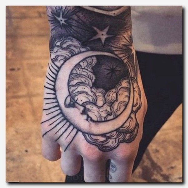 Moon Design: The Dark Night Sky With an Overlooking Crescent Moon Tattoo Design