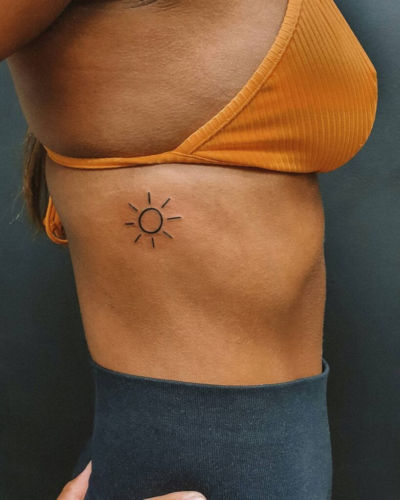 Minimal Sun Rib Tattoo Tattoo Design