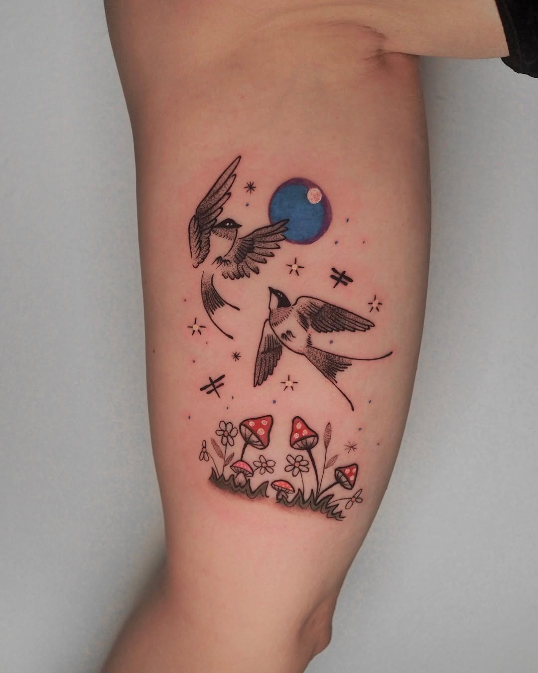 Charming swallow tattoos with vibrant details Tattoo Design