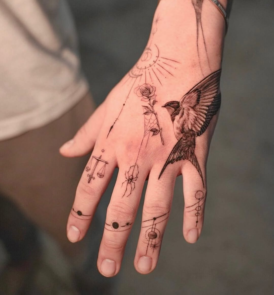 Elegant swallow tattoo on the hand Tattoo Design