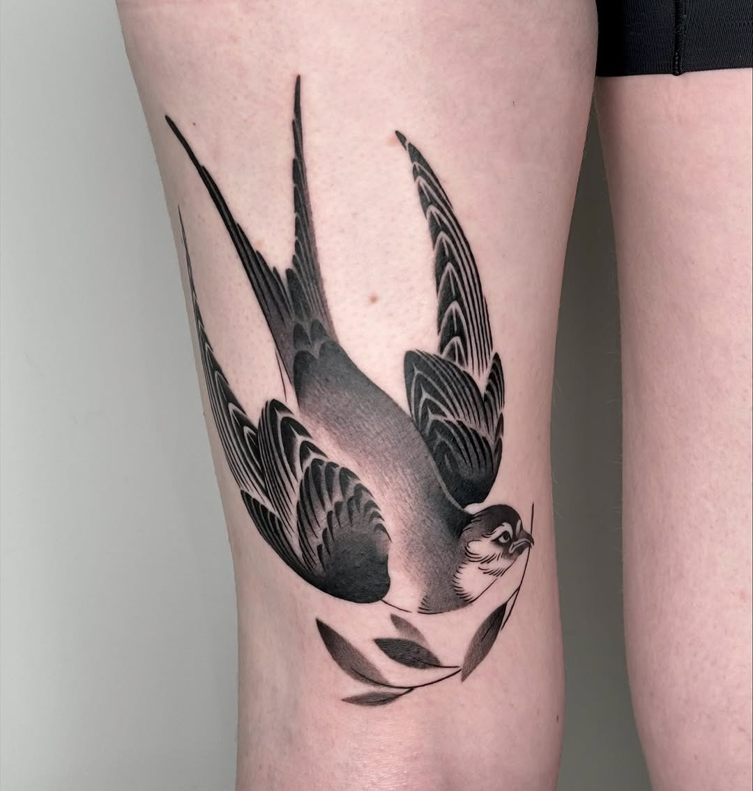 Elegant swallow tattoo with intricate details Tattoo Design