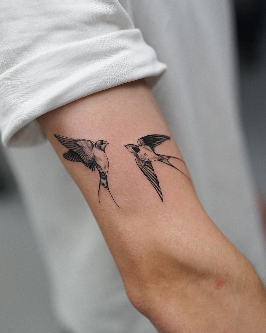 Elegant swallow tattoos capturing freedom and movement Tattoo Design
