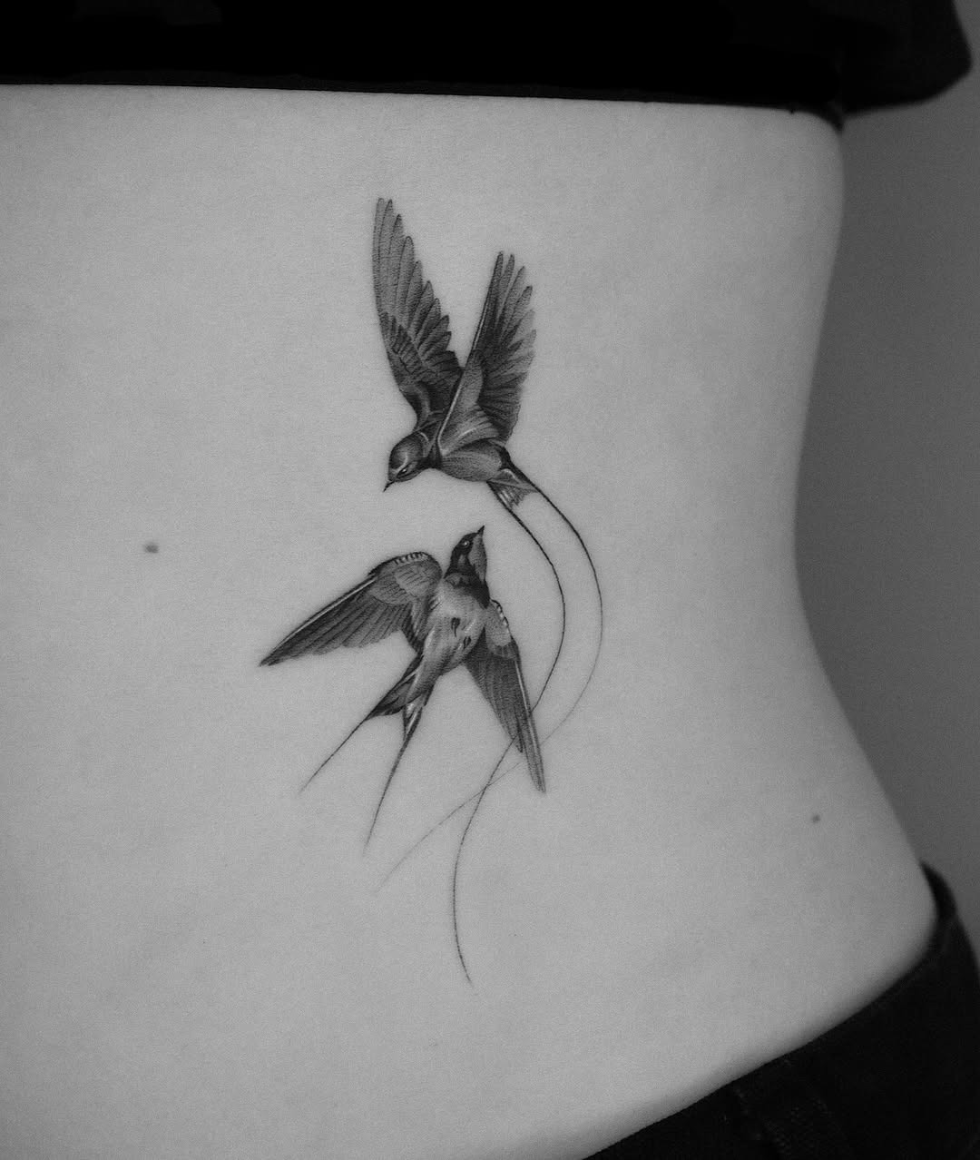 Graceful swallows in flight tattoo design Tattoo Design
