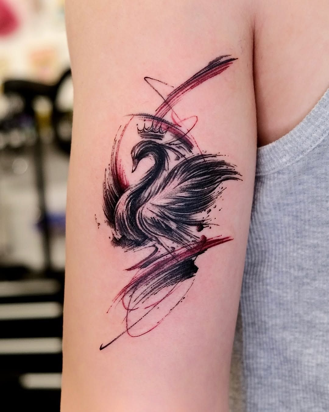 Red and Black Abstract Swan With Crown Tattoo Design