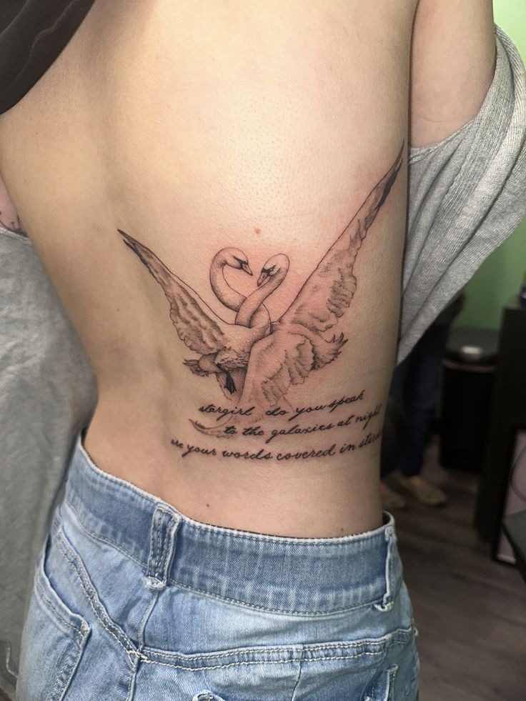 Romantic Rib Swan Pair With Script Tattoo Design