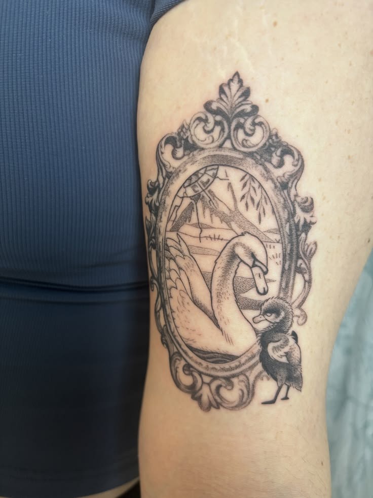 Storybook Swan and Cygnet in an Ornate Frame Tattoo Design