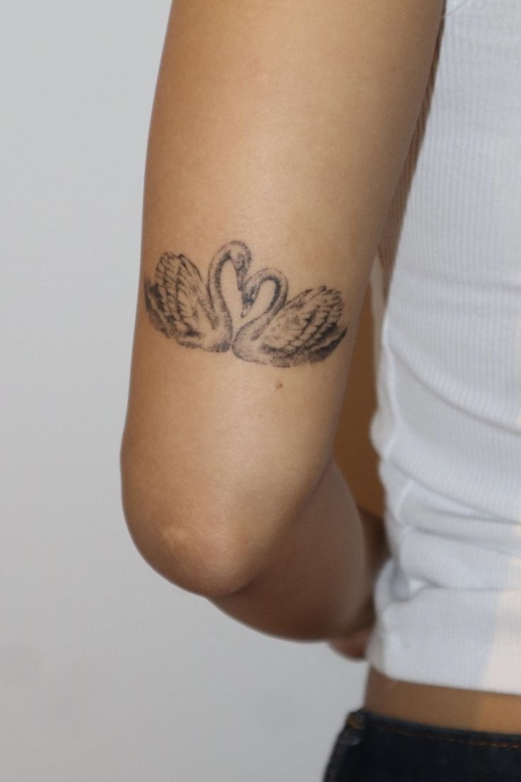 Tiny Two Swans With a Soft Heart Shape Tattoo Design