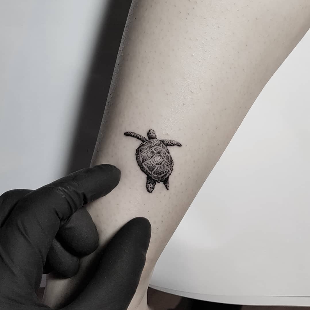 A striking realistic sea turtle tattoo design Tattoo Design