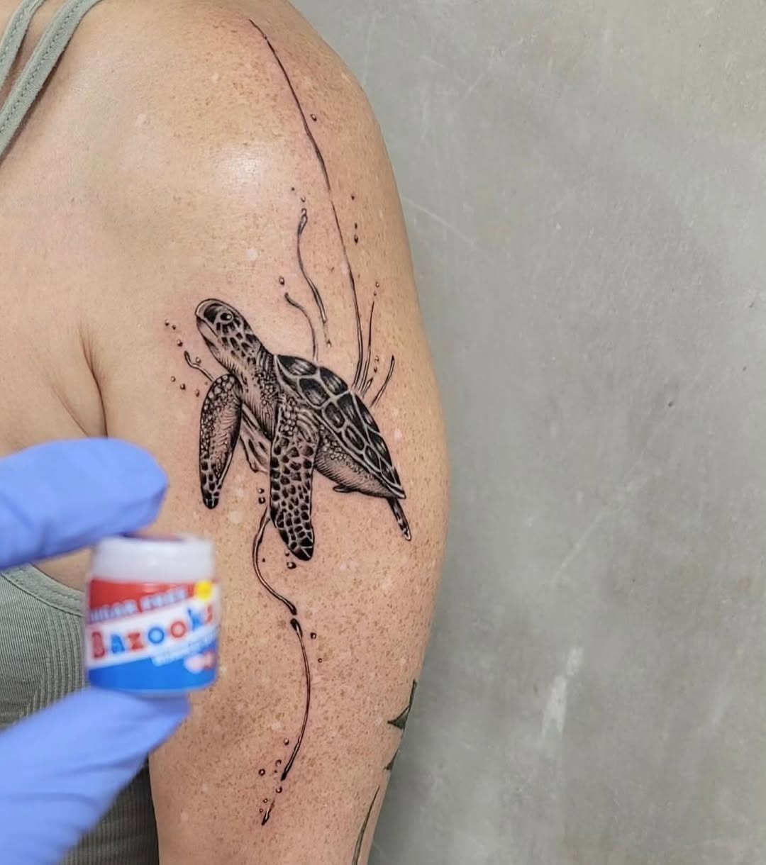 Beautiful sea turtle tattoo with water elements Tattoo Design