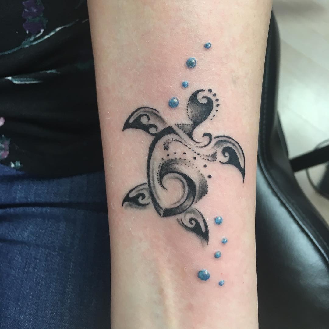 Elegant tribal sea turtle tattoo with waves Tattoo Design