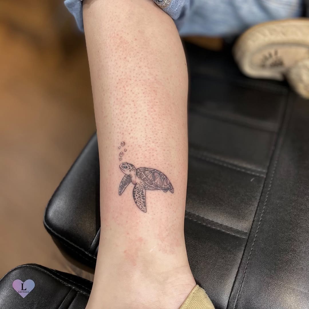 Minimalist Sea Turtle Tattoo with Bubbles Tattoo Design