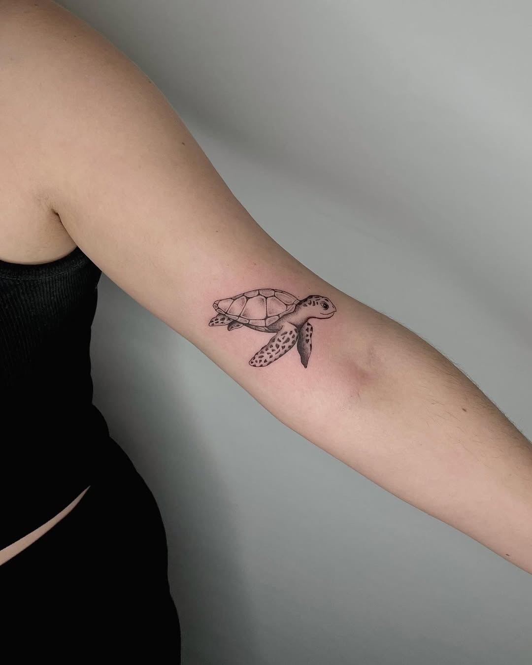 Minimalist Turtle Tattoo Design on the Arm Tattoo Design
